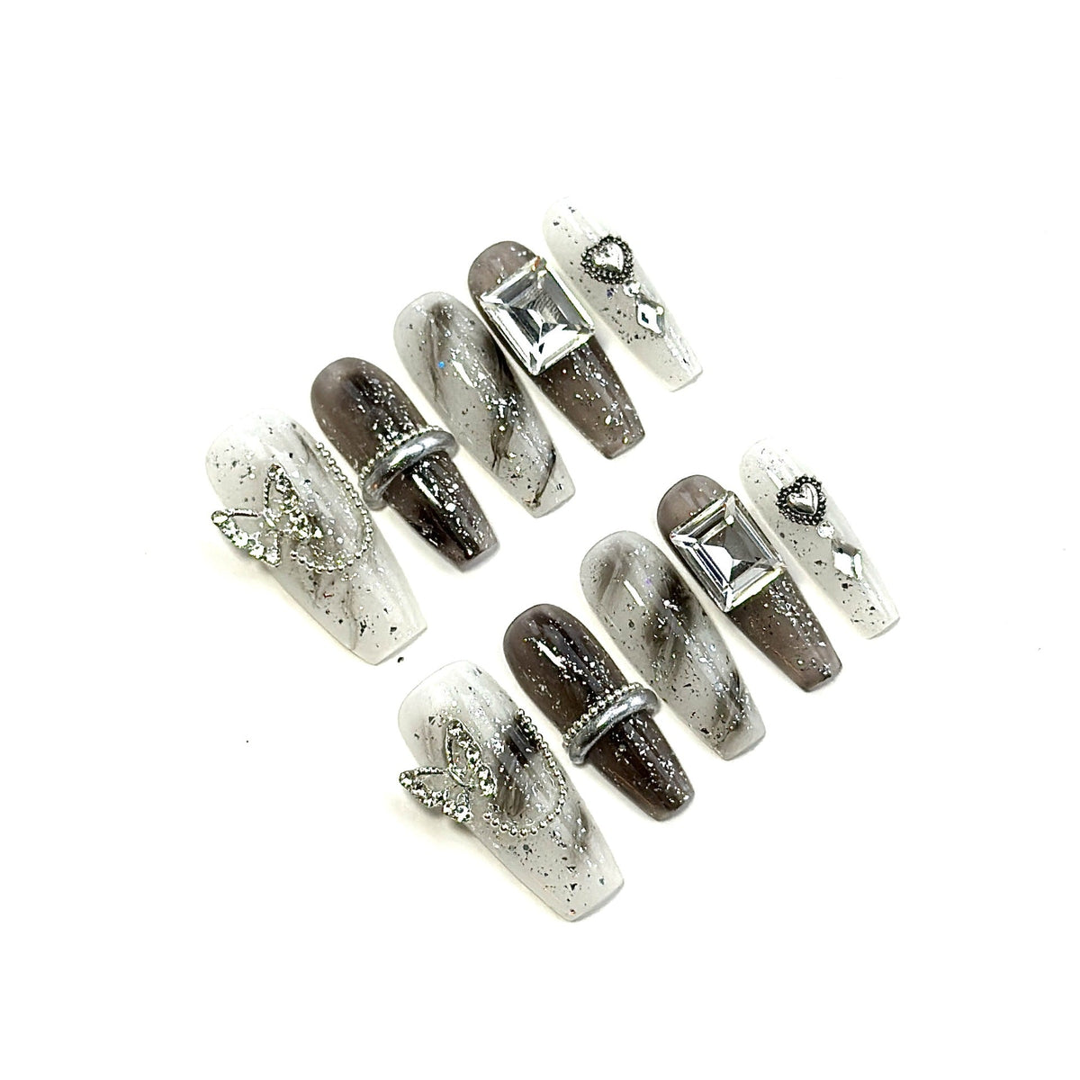 Set de faux ongles avec ornements géométriques en strass