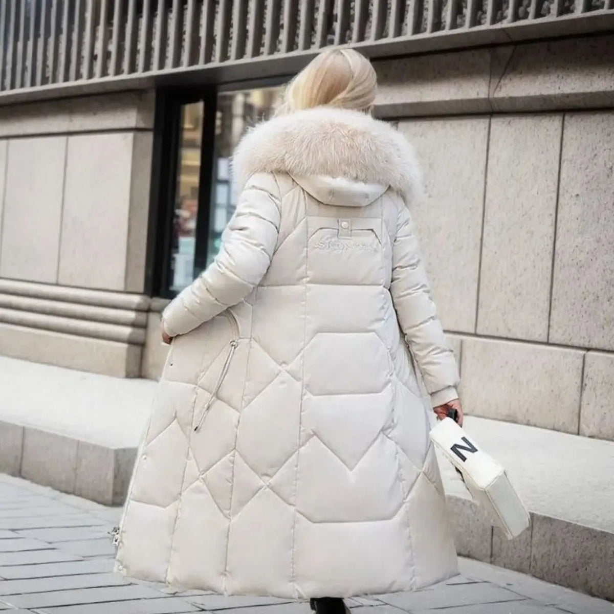 Women's Long Hooded Quilted Coat with Faux Fur Trim