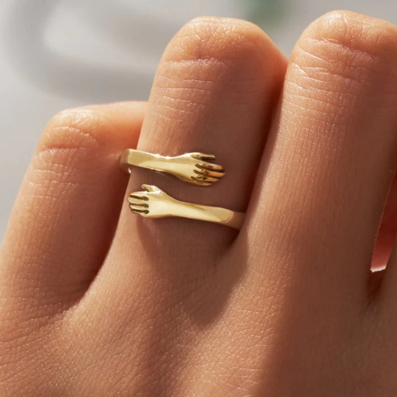 Bague ouverte réglable avec mains entrelacées