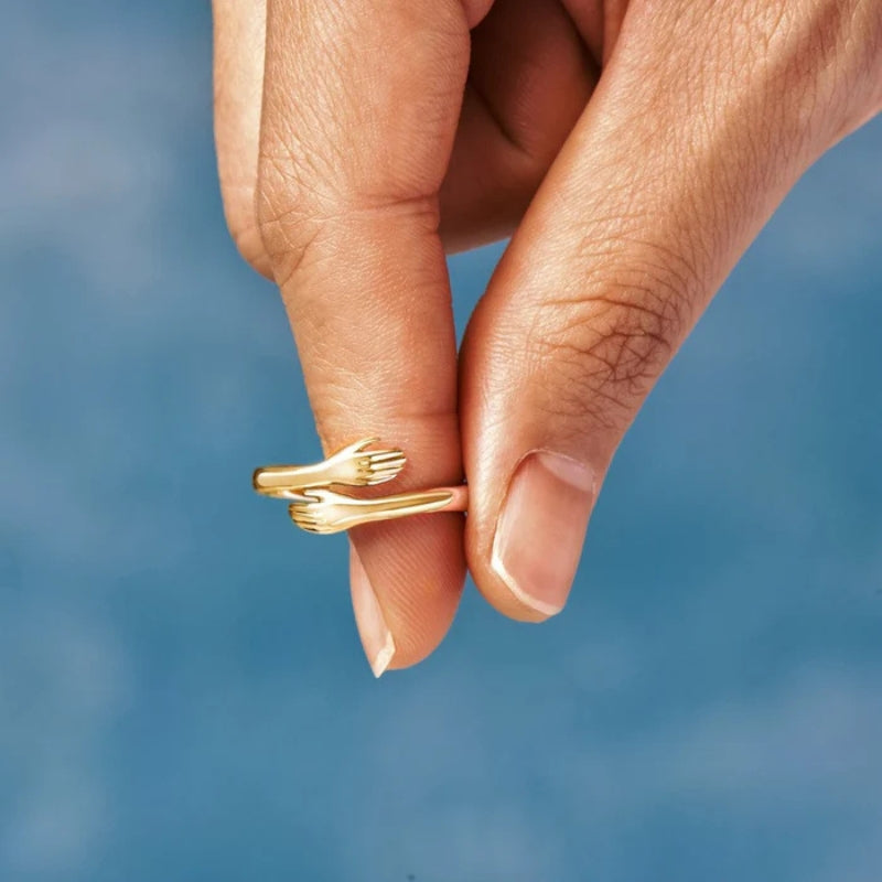Bague ouverte réglable avec mains entrelacées