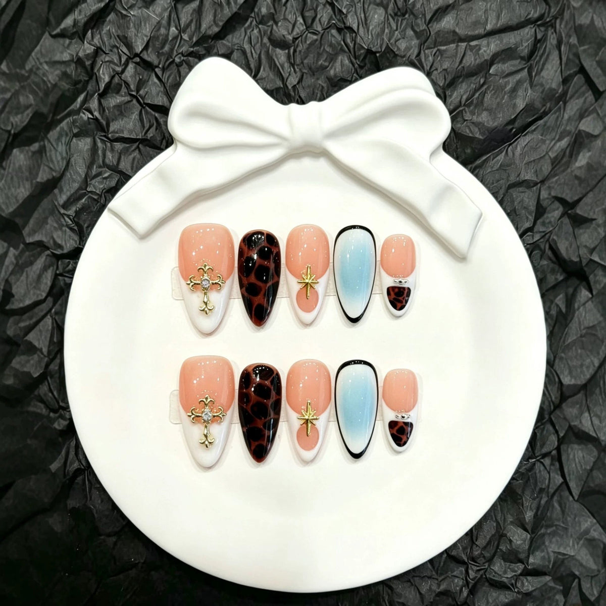 Artistic Press-On Nail Set with Decorative Elements