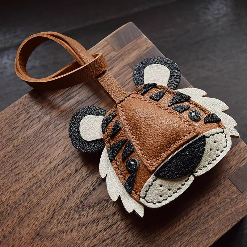 Breloque de sac et porte-clés en cuir noir sans visage