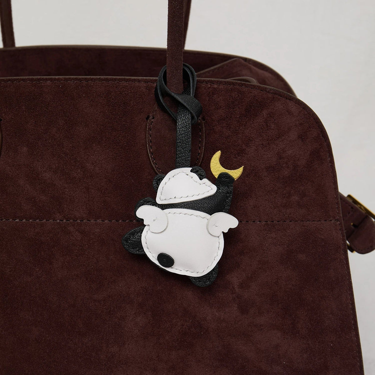 Breloque de sac et porte-clés en cuir noir sans visage