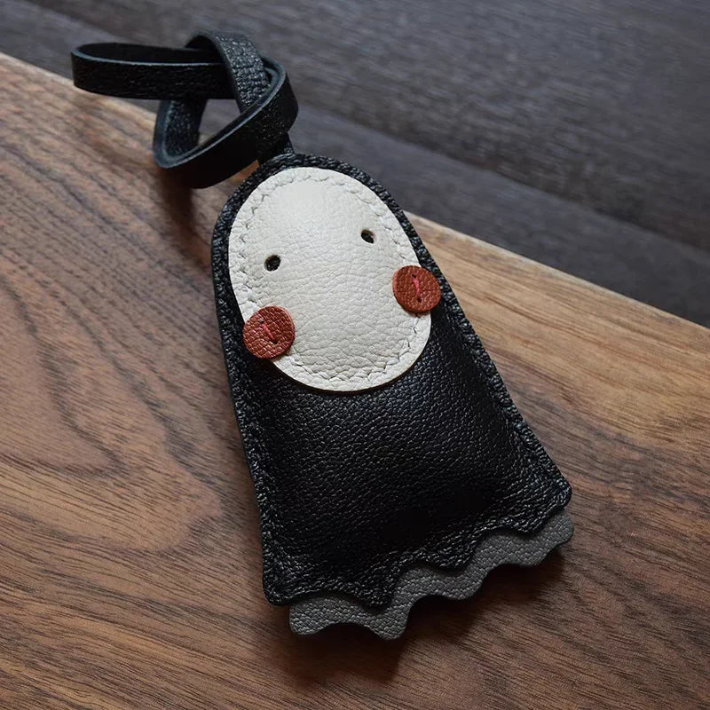 Breloque de sac et porte-clés en cuir noir sans visage