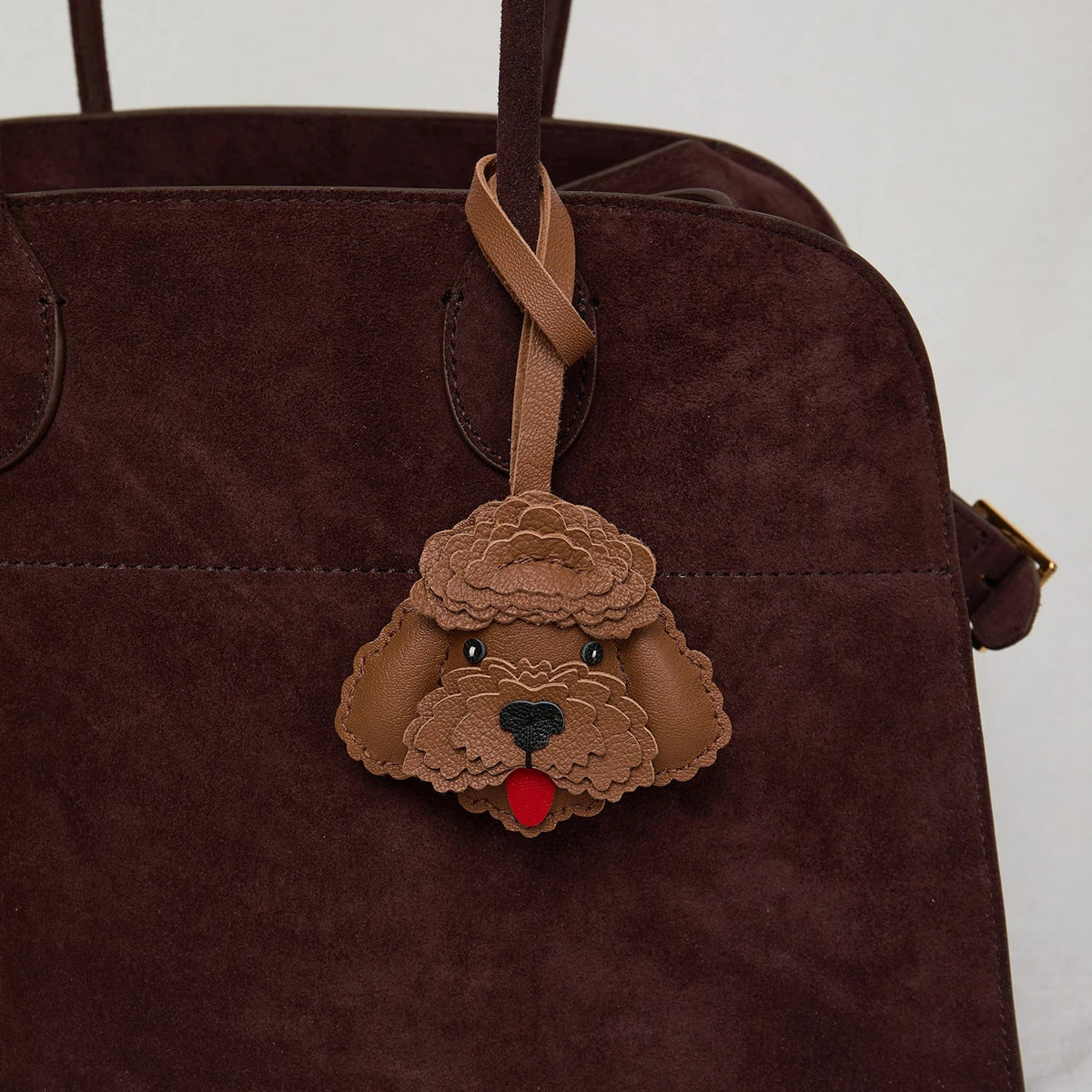 Breloque de sac et porte-clés en cuir noir sans visage