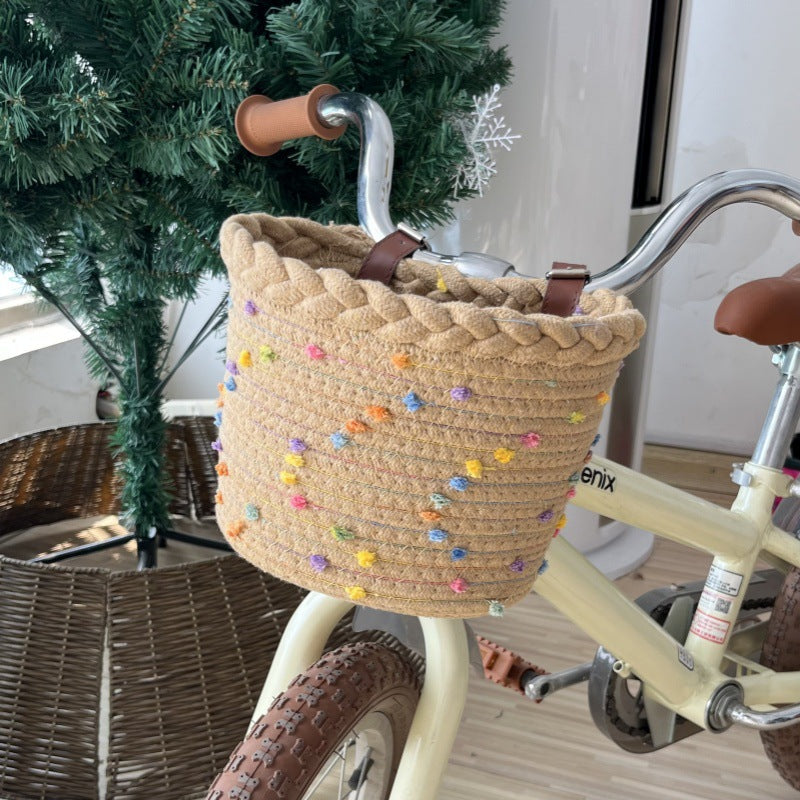 Braided Rope Bike Basket with Pom-Pom Embellishments and Leather Handlebar Straps