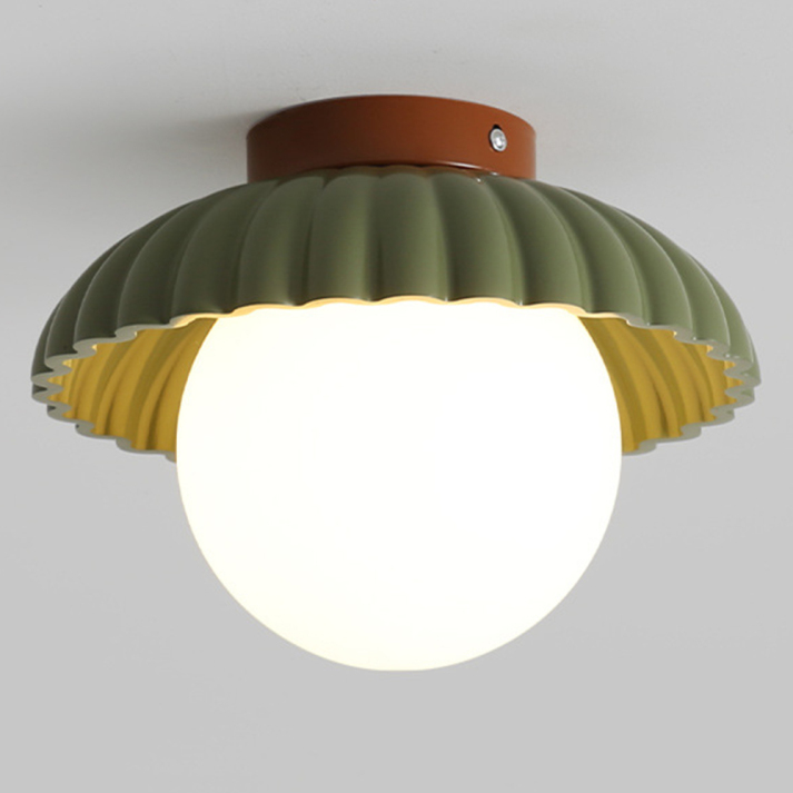 Ceiling lamp with a frosted shade providing warm lighting in the hallway
