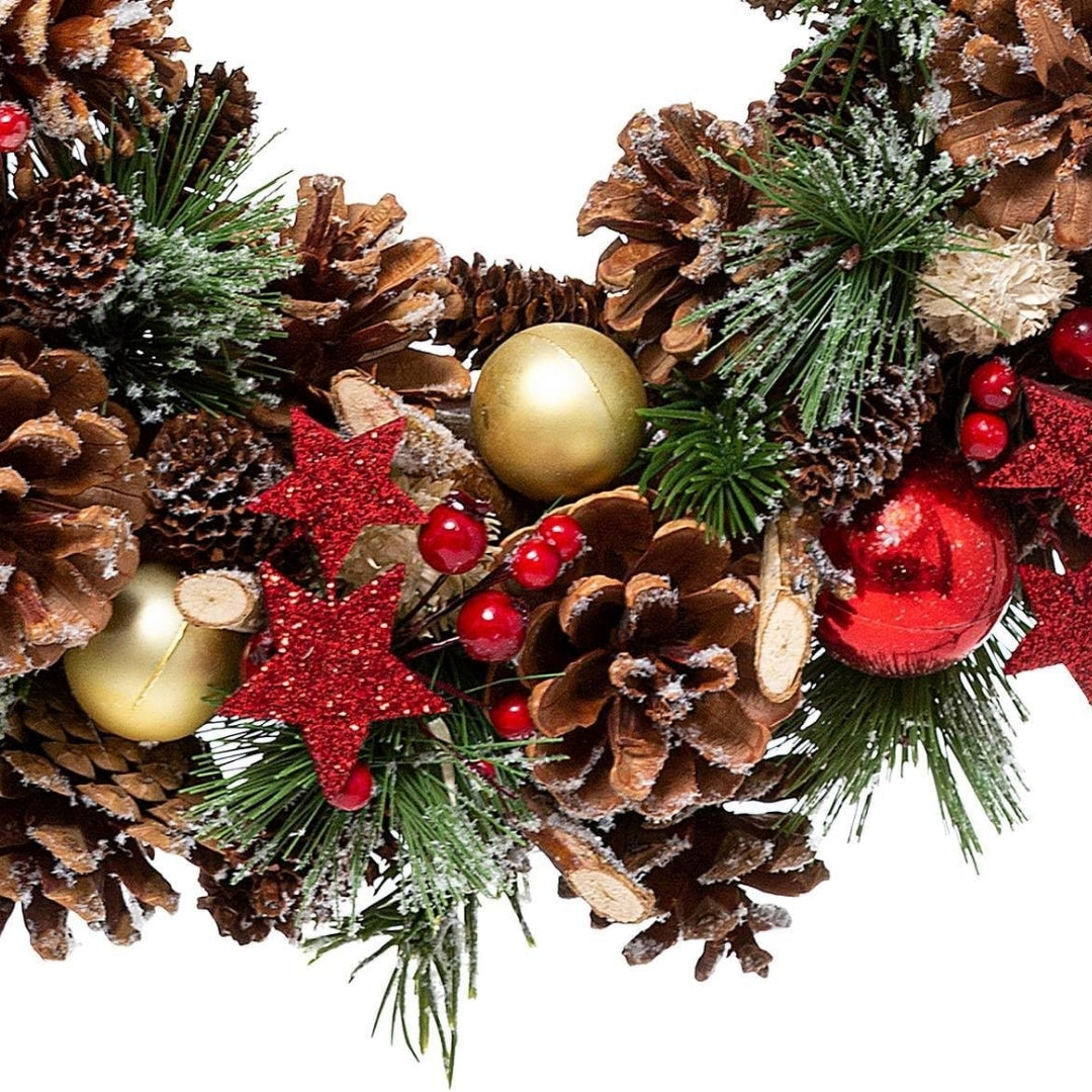 Couronne de Noël avec étoile décorative en houx