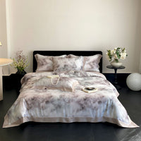 Parure de lit en satin de coton avec imprimé marbré à l’aquarelle et fin ourlet