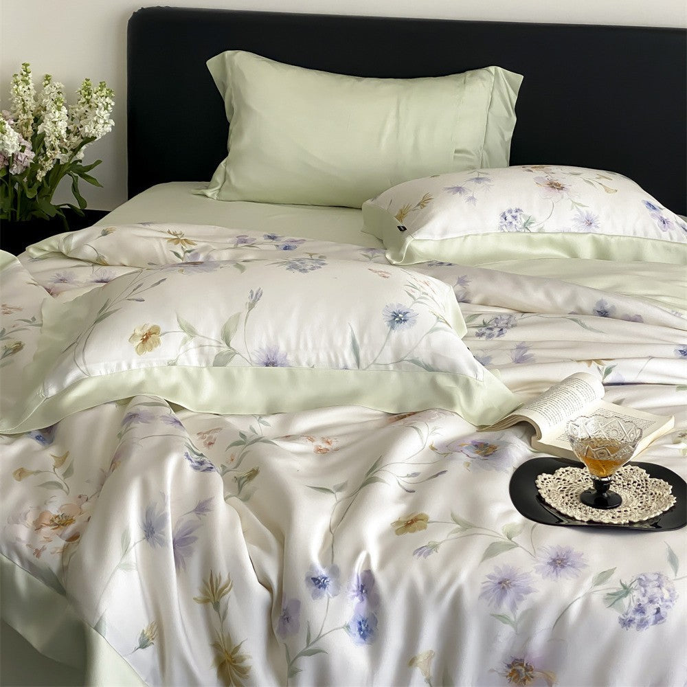 Parure de lit en satin de coton avec imprimé marbré à l’aquarelle et fin ourlet