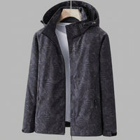 Davy | Chaqueta impermeable con capucha y estampado de hojas para mujer