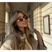 Davy | Gafas de sol ovaladas con montura dorada para mujer