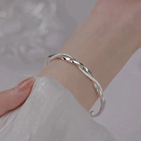 Bracelet Spirale Argenté - Design Torsadé Chic
