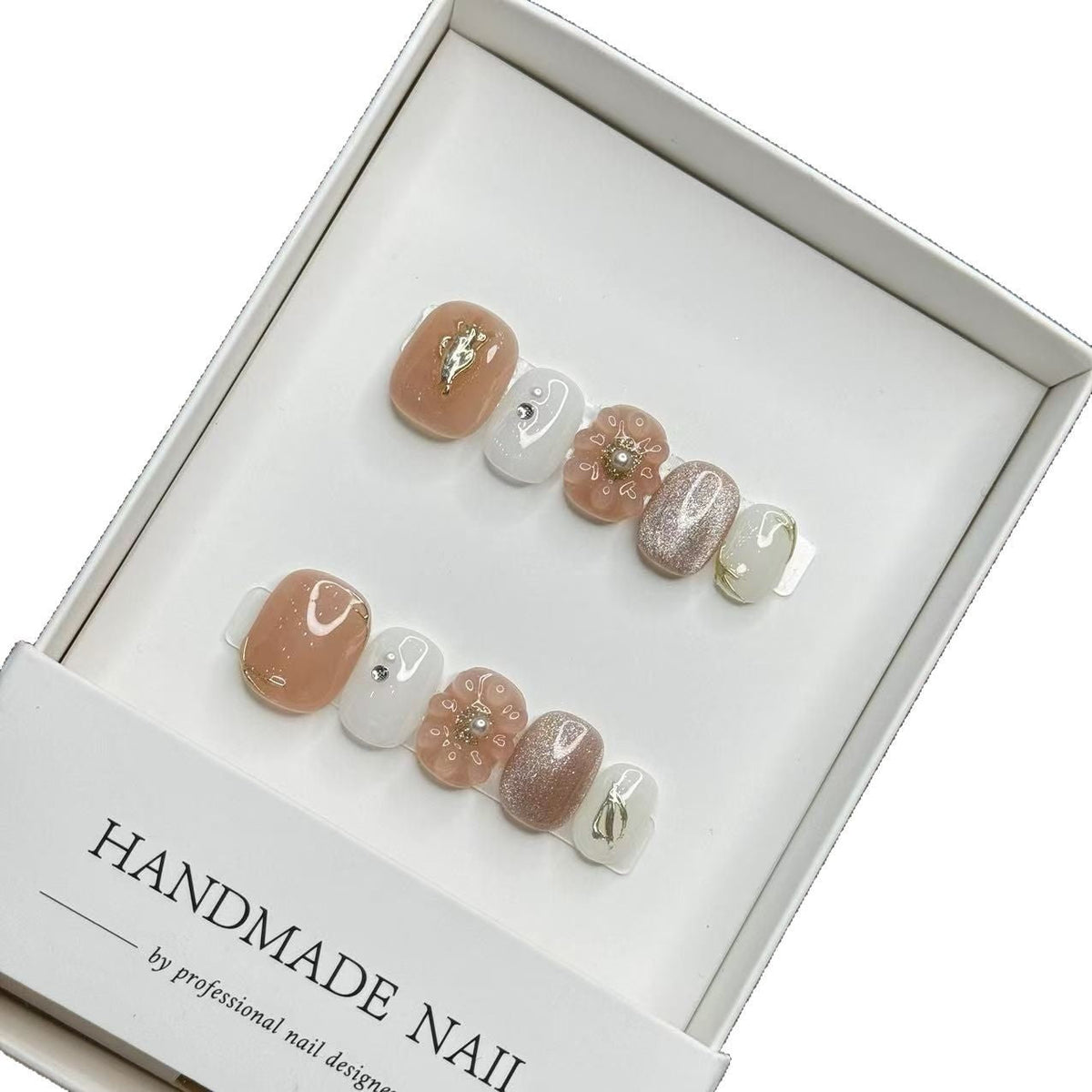 Set de faux ongles faits main avec motifs floraux et ornements en pierres
