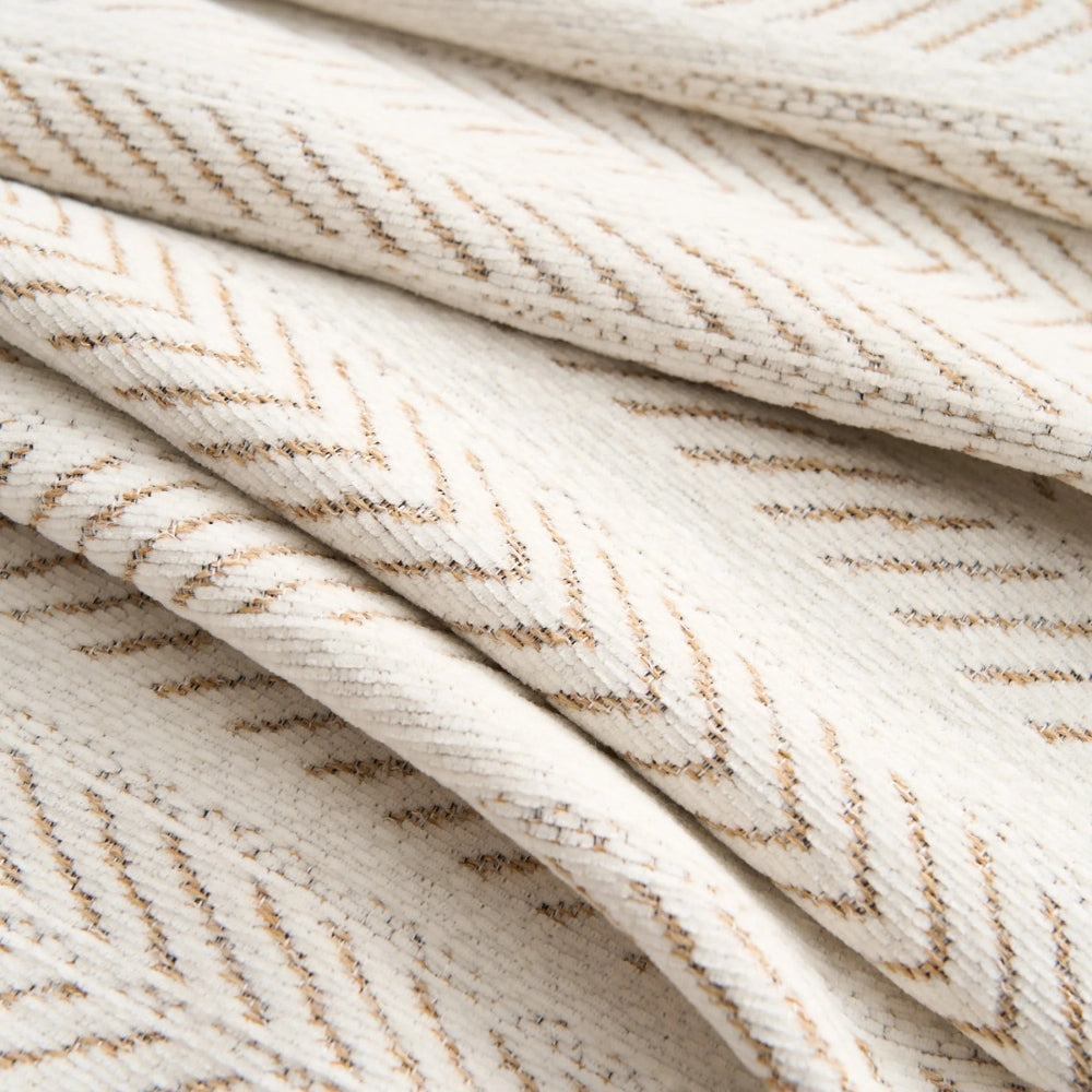 Housse de canapé en chenille à motif chevrons avec glands