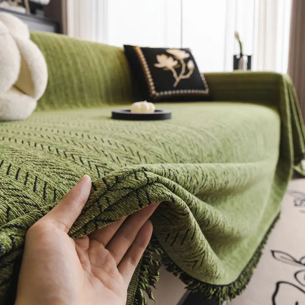 Housse de canapé en chenille à motif chevrons avec glands