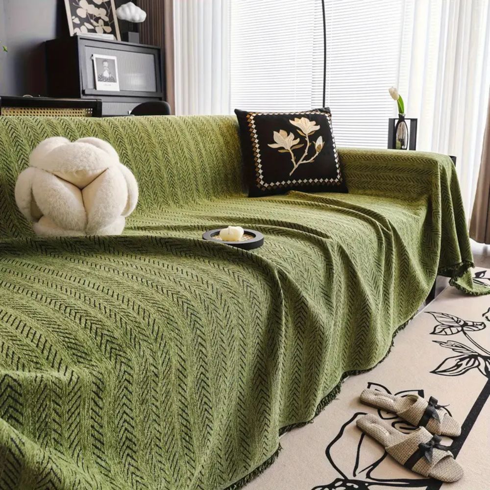 Housse de canapé en chenille à motif chevrons avec glands