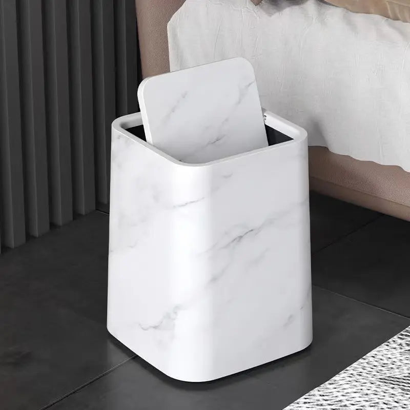Poubelle au design marbre avec couvercle battant