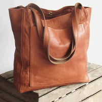Grand sac de transport en cuir naturel