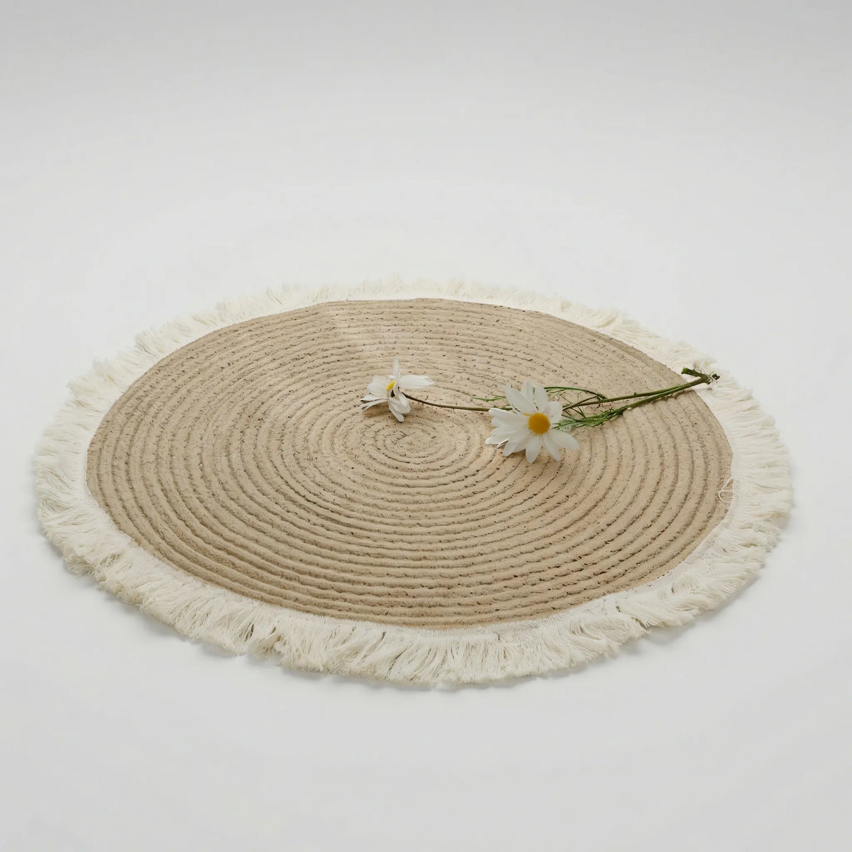 Tapis rond tressé à franges