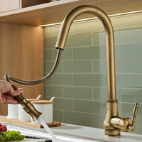 Robinet de cuisine antique en bronze avec douchette extractible et activation tactile