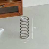 Soporte para cepillos de dientes de acero inoxidable en espiral