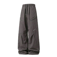 Unisex Wide-Leg Technical Cargo Pants with Drawstring Waist and Zipper Pockets