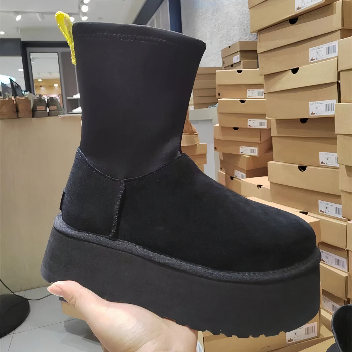 Bottes pour femme à tige lisse et fermeture éclair latérale