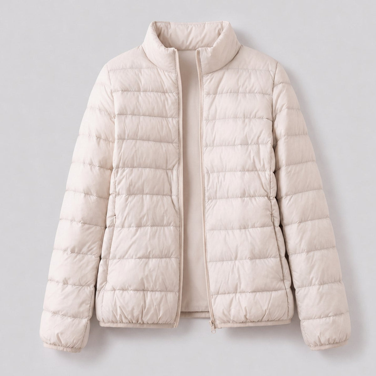 Veste matelassée légère pour femme, garnie de duvet et à col montant