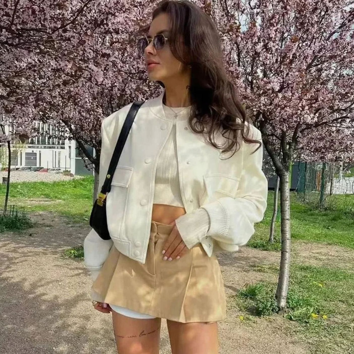 Blouson bomber léger pour femme en similicuir, avec fermeture à boutons-pression sur le devant et poches