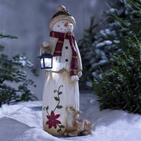 Bonhomme de neige et père Noël des bois